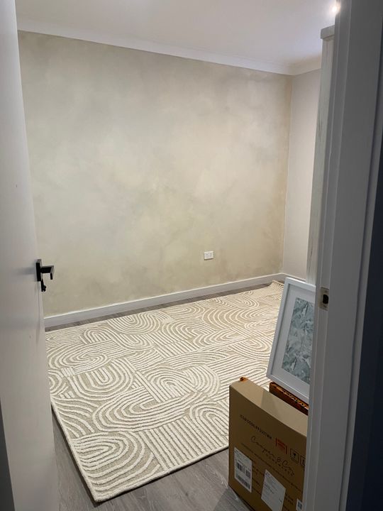 Maisie Cream and Ivory Textured Tribal Rug