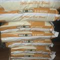 Stack of BuildASoil 3.0 Recipe Artisanal Soil Blends bags in brown and white packaging