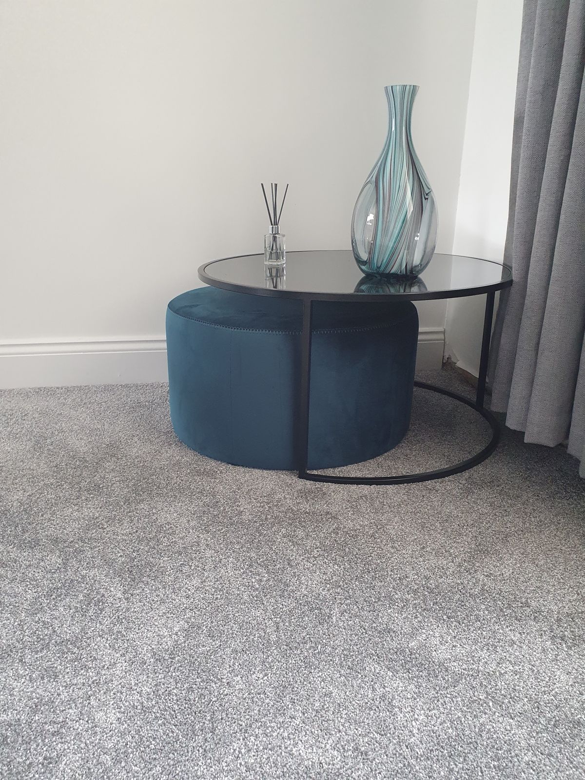 Thea Black Round Coffee Table and Light Grey Pouffe Set