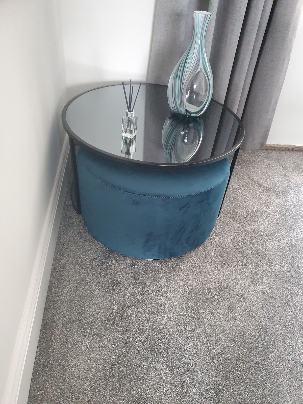 Thea Black Round Coffee Table and Light Grey Pouffe Set